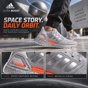 Adidas UltraBoost NASA FX7957 — SPACE STORY. DAILY ORBIT.; Adult walking modern science-museum plaza, exact metallicsilver f…