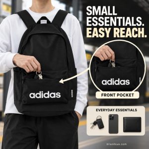 Adidas Backpack - Black — SMALL ESSENTIALS. EASY REACH.; Neck-down adult carries exact black backpack front-facing at transi…