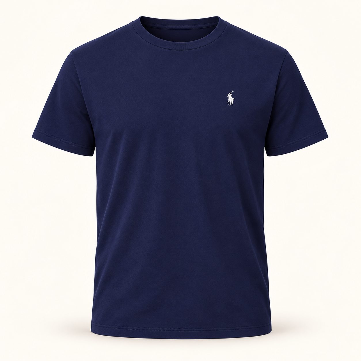 Polo Ralph Lauren shirt — Navy blue — front view of navy T-shirt on warm ivory background
