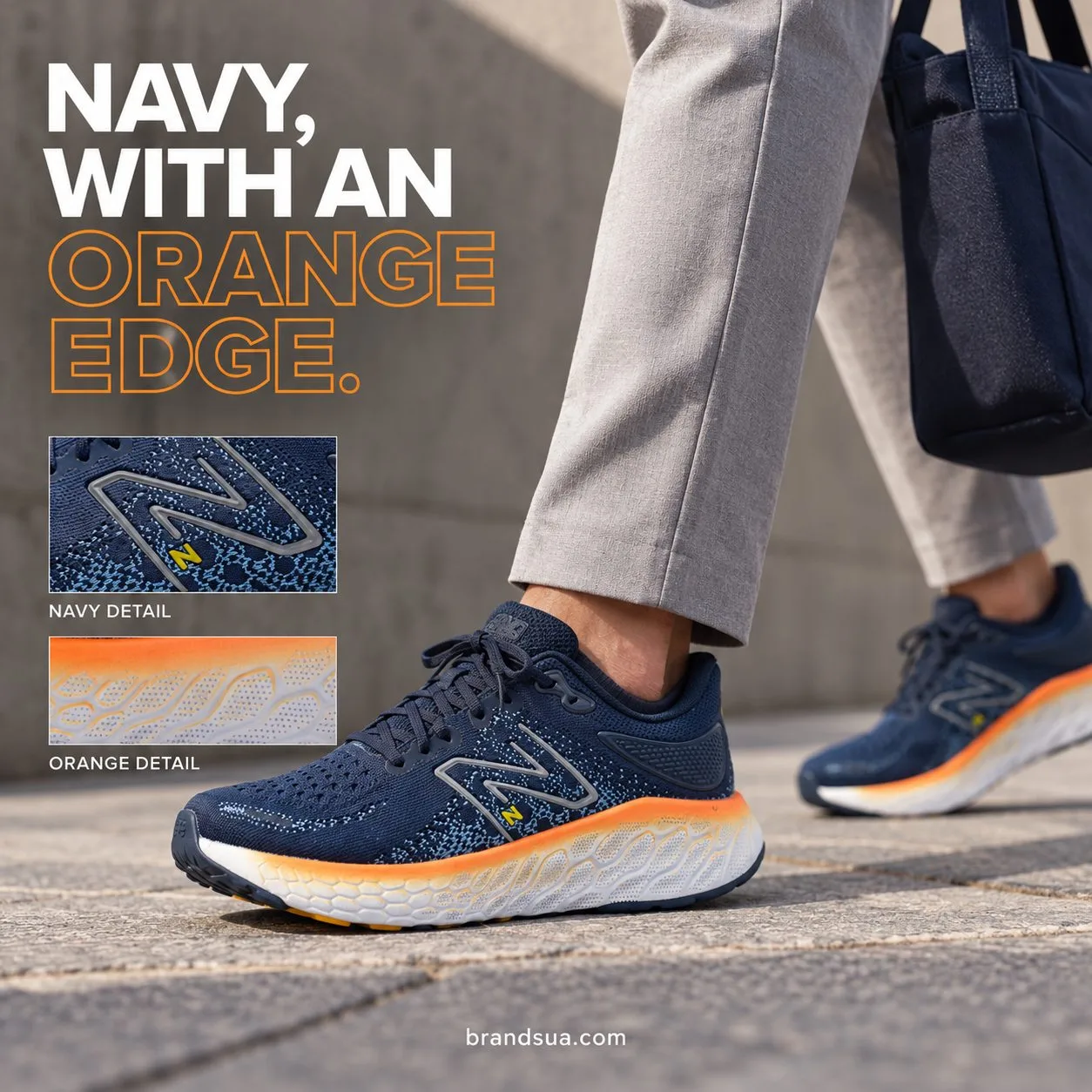 New Balance Fresh Foam Navy M1080E12 — Adult walking in pale grey trousers and plain navy bag at side, city pavement. Off-ce…