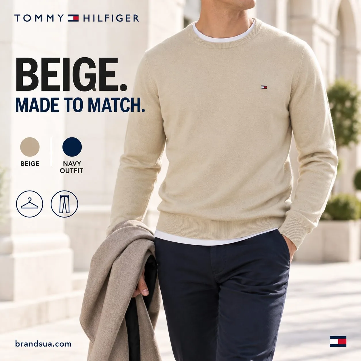 Tommy Hilfiger Pima Organic Cotton Cashmere — Adult in beige sweater moves through a pale architecturalcourtyard wearing dar…